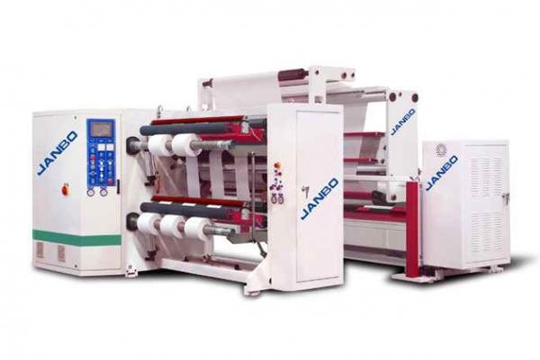 Two-axis center surface slitting and rewinding machine